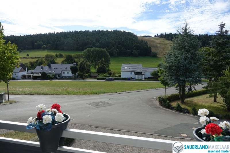 VERKOCHT Modern appartement Usseln met uitzicht op de skipiste 1