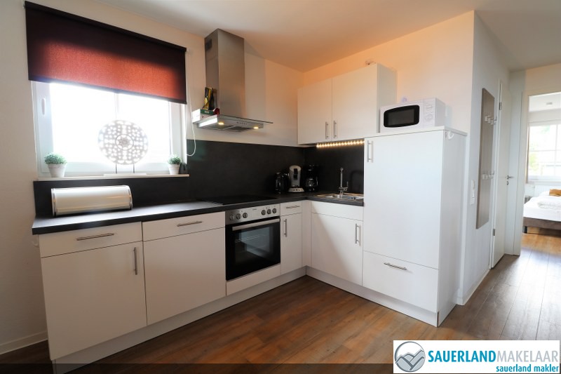 VERKOCHT Nagenoeg nieuw penthousepisteappartement Neuastenberg 6