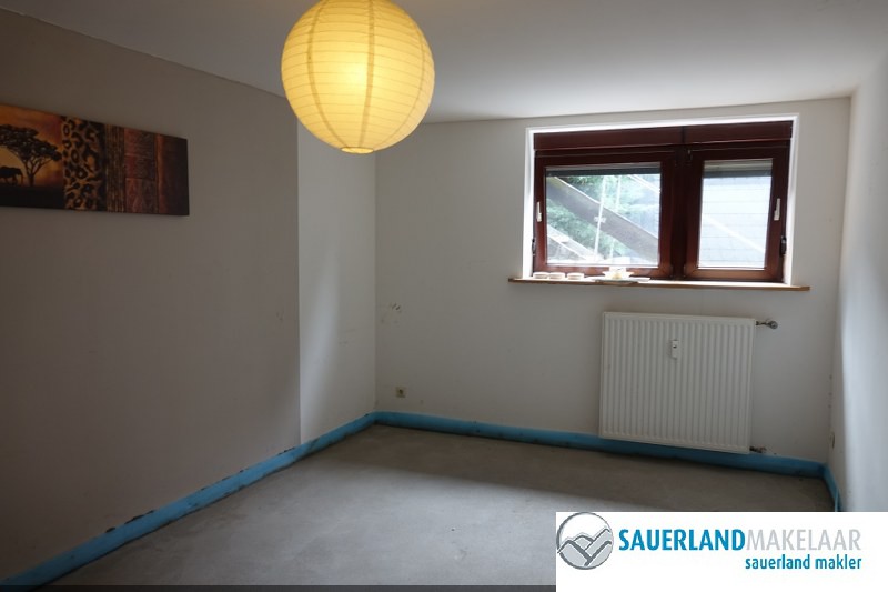 Ruim 3 kamerappartement in Niedersfeld met tuin en balkon 6