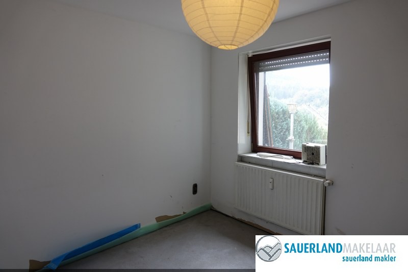 Ruim 3 kamerappartement in Niedersfeld met tuin en balkon 7