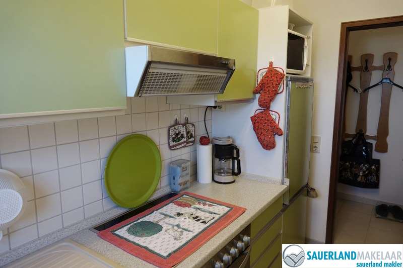 VERKOCHT nabij piste gelegen 2 kamerappartement in Usseln 7