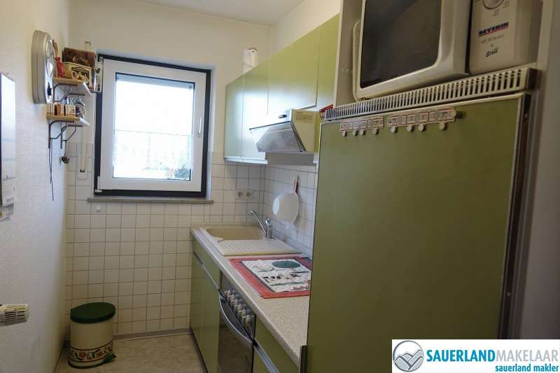 VERKOCHT nabij piste gelegen 2 kamerappartement in Usseln 8
